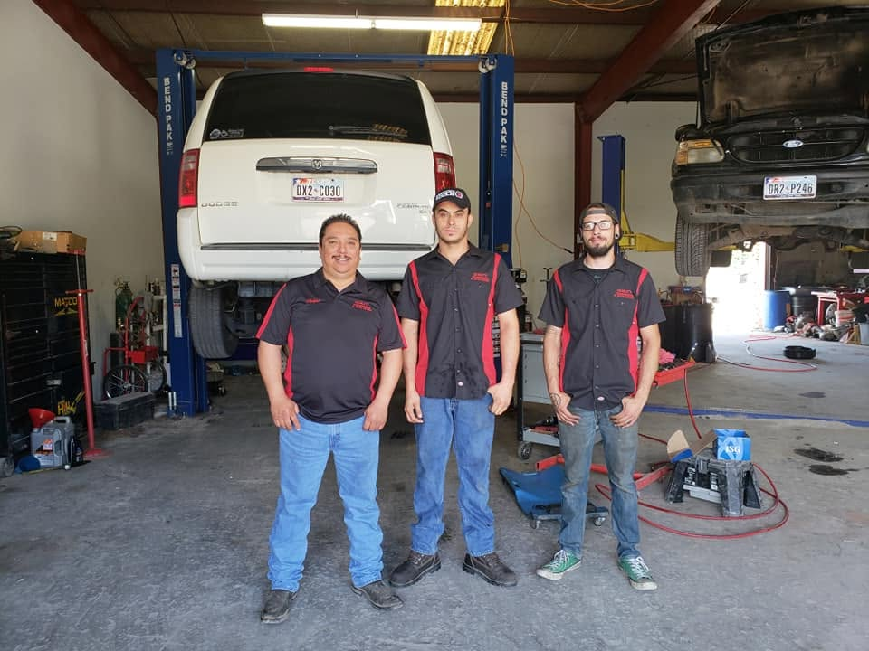 Members of the Quality Transmission team at the shop